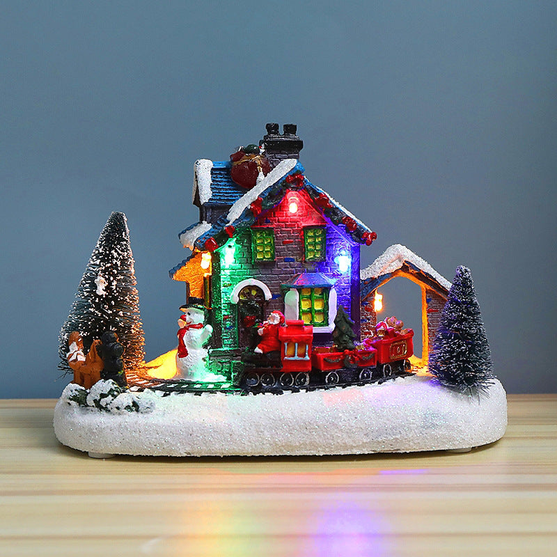 Illuminated Christmas village house made of resin