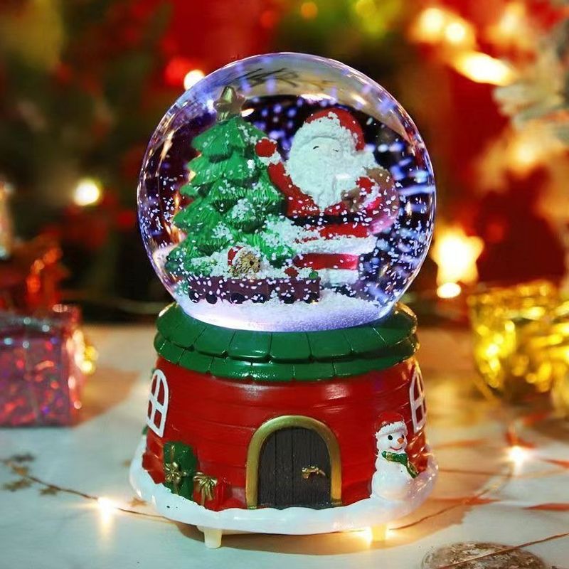 Christmas snow globe with music and light