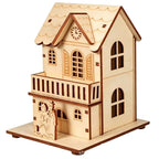 Illuminated wooden Christmas house, table decoration