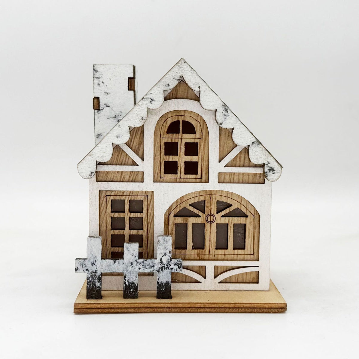 Illuminated wooden Christmas house with LED