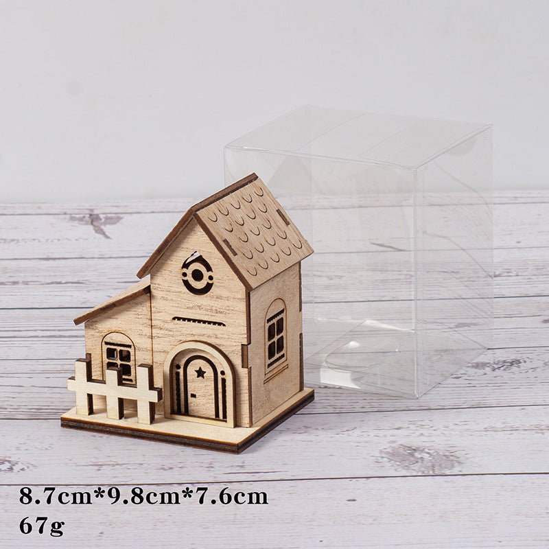 Illuminated wooden house for Christmas decoration
