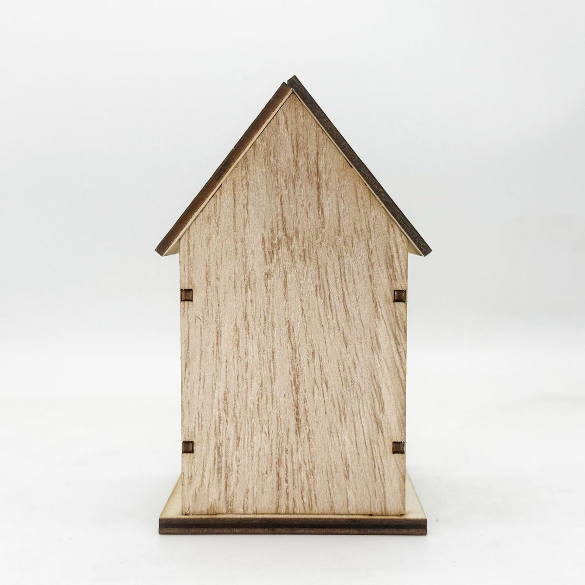 Illuminated wooden Christmas house with LED