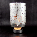 Rotating tea light holder made of brass, openwork design