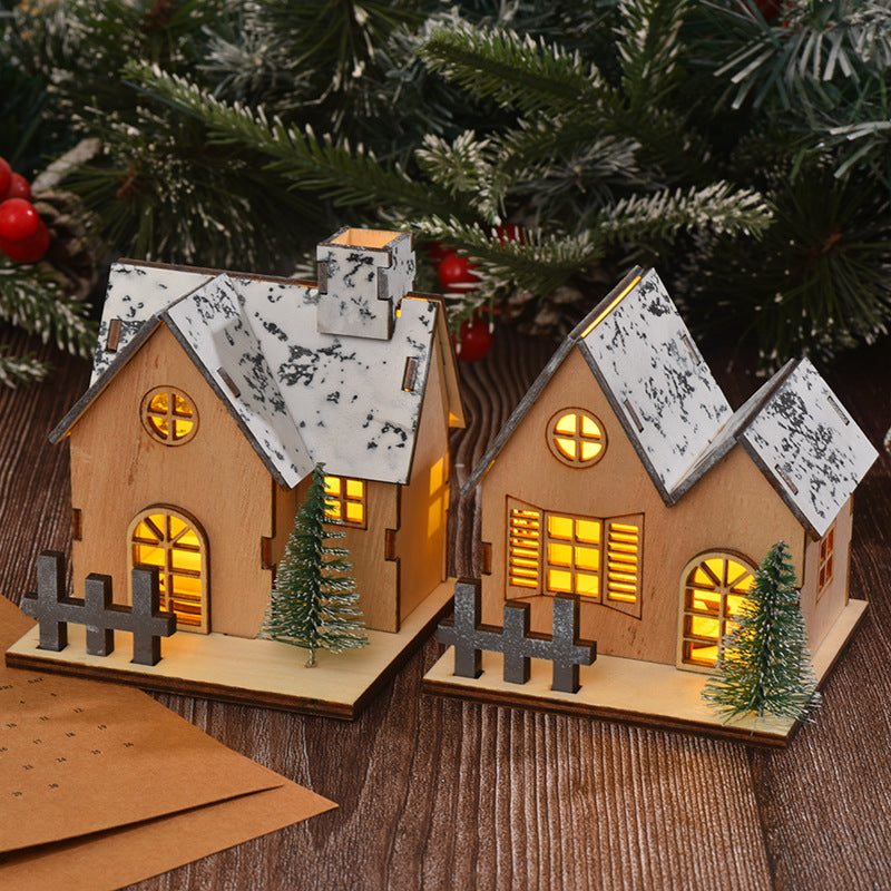 Illuminated wooden Christmas house with LED