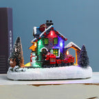 Illuminated Christmas village house made of resin