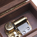 Wood music box made of walnut wood with natural grain
