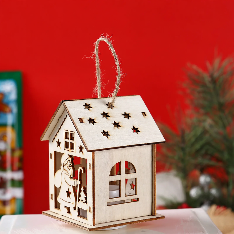 Illuminated wooden house for Christmas decoration