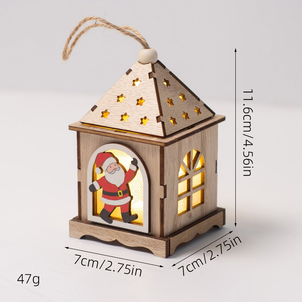 Illuminated wooden house as Christmas decoration