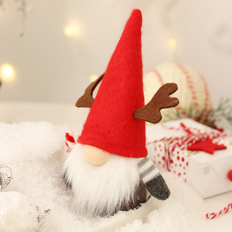 Christmas elf figure with star and antlers, 18x7 cm